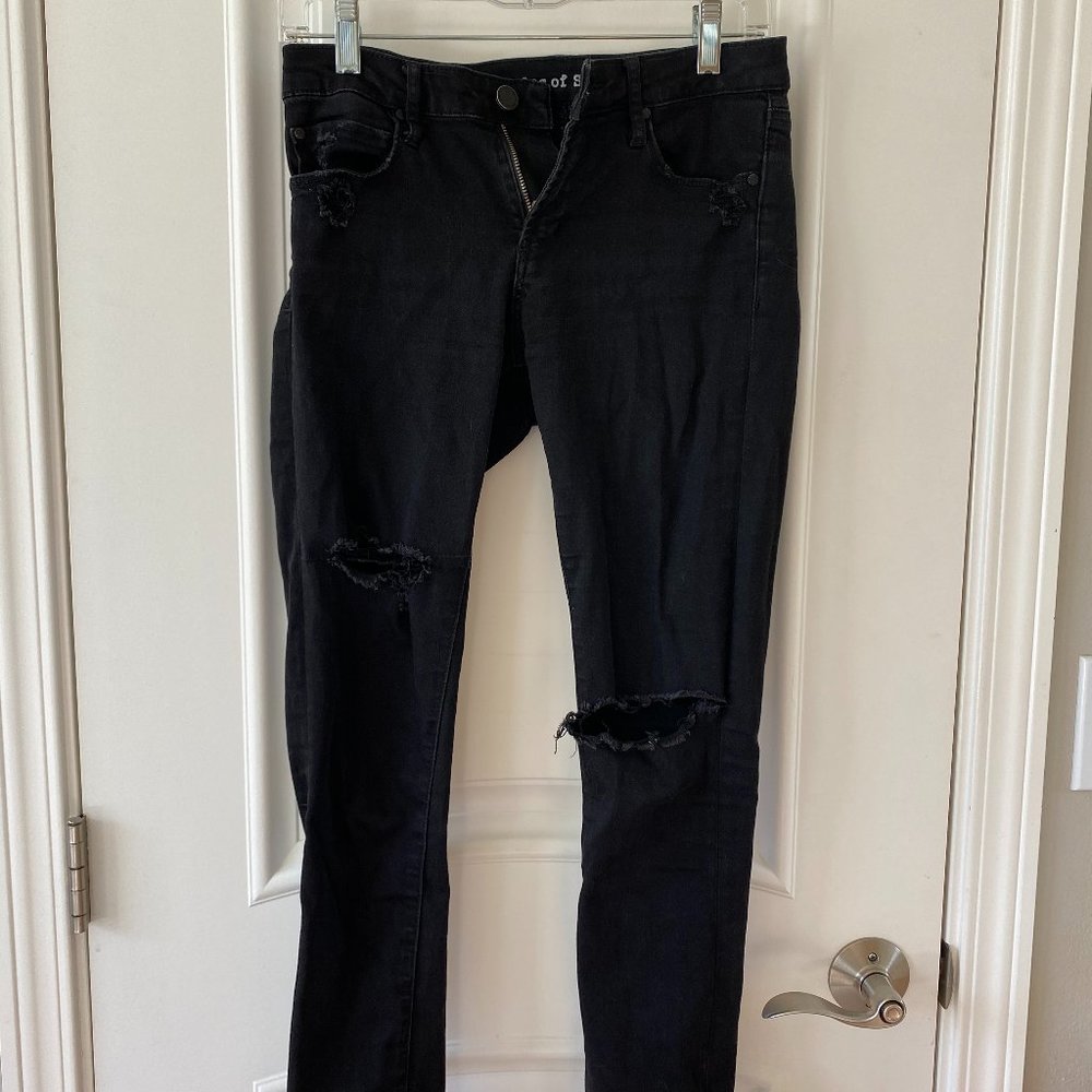 Black Articles of Society ripped jeans